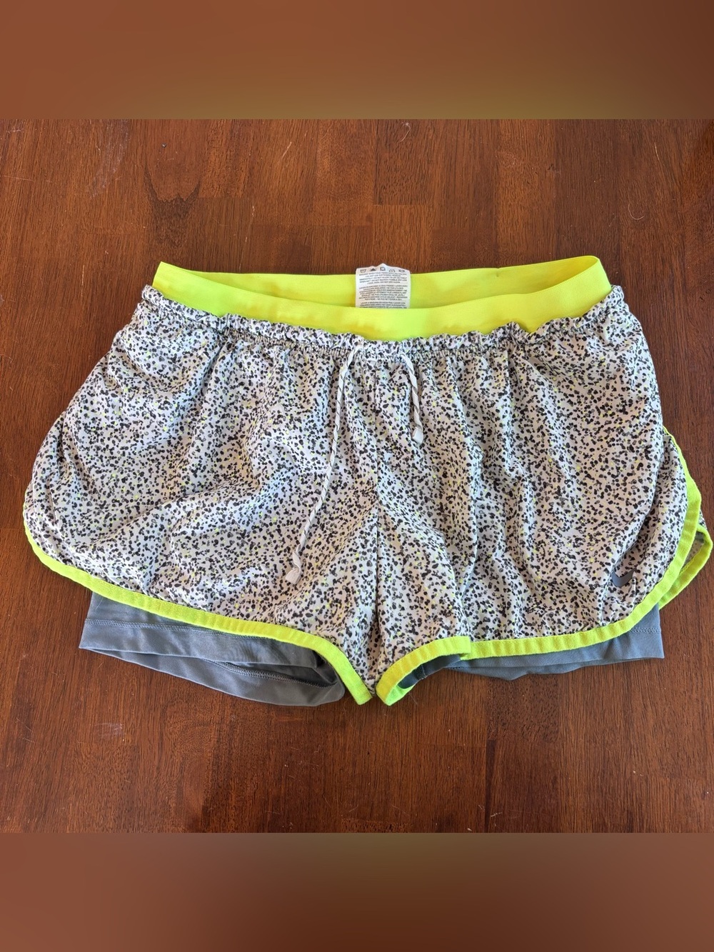 Nike Women's White Speckled Athletic Shorts with Neon Yellow Trim